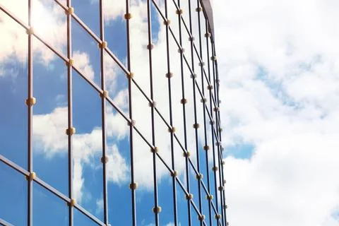 Sun light sky cloud reflection in glass office building Stock Photos