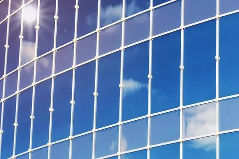 Sun light sky cloud reflection in glass office building Stock Photos