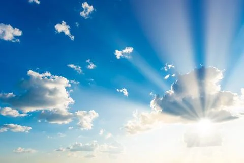 Sun light through cloud on blue sky Фото