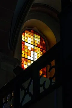 Sun light through the leaded pane in old majestic church 스톡 사진