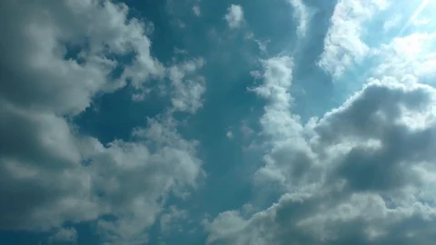 Sun Lights and Summer Rain Clouds on Sky