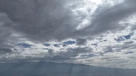 Sun lights coming between clouds. Stock Footage 289581146