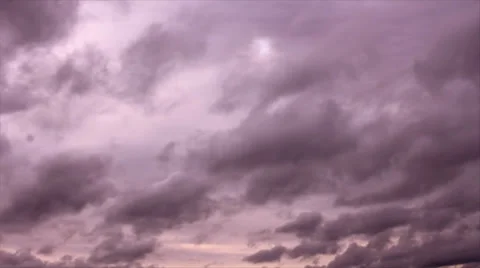 Sun lights on purple sky clouds Stock-Footage 34760188