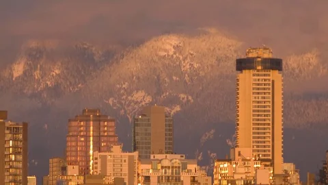 Sun lights reflection on buildings at sunset time Video stock 73841702