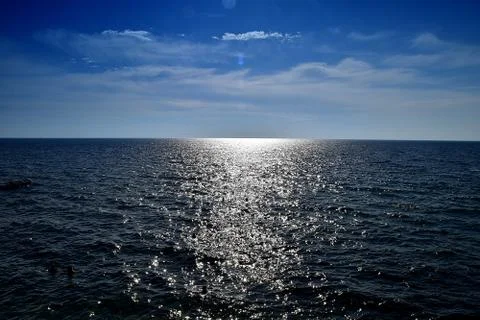The sun is looking at itself in the sea Foto stock