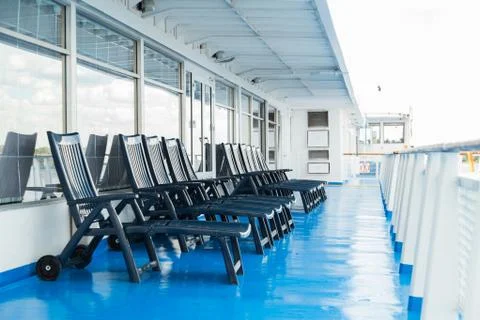 Sun loungers on deck Stock Photos