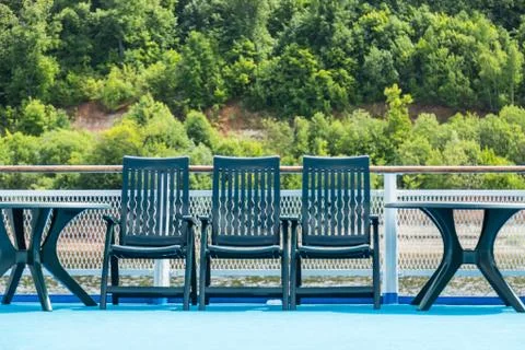 Sun loungers on deck Stock Photos