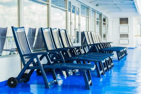 Sun loungers on deck Stock Photos