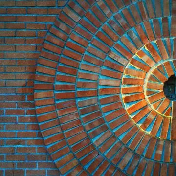 Sun made out of red bricks in a circle pattern Stock Photos