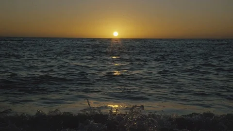 Sun melting into the horizon Stock-Footage 125214799