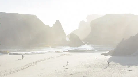 Into sun misty walkers view  rocks late sun bandon photographer Stock Footage 27676922