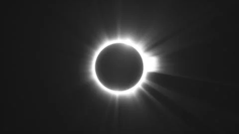 Sun, Moon and earth aligned for Total Solar Eclipse. Seamless Loop Stock Footage 247684574