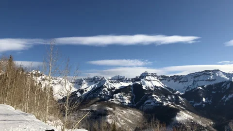 Sun Mountain distant Snow Pine Tree Stock Footage 156940699