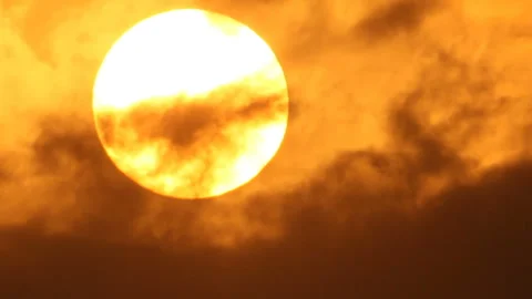 Sun move to horizon in clouds Stock Footage 123703895