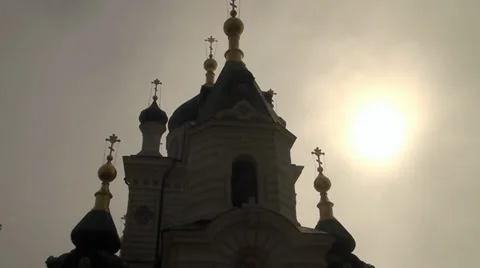 A sun moves in clouds on a background christian crosses Stock Footage 33460937