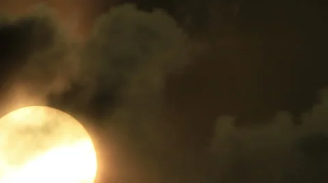 Sun moves in clouds Stock Footage 53304088