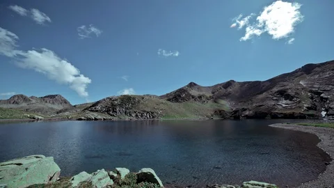 Sun moving over the Mountain lake Timelapse Stock Footage 87265028