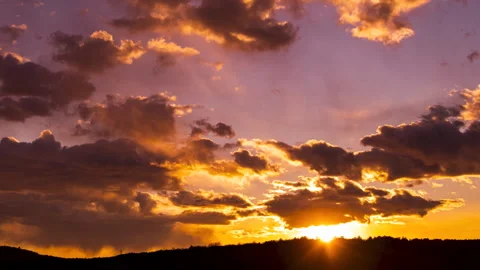 Sun moving through clouds timelapse evening dramatic sunset sky time lapse 4K Stock Footage 150912461