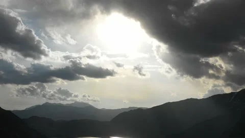 The sun from the natural river waterfall in the mountains in a magical sunset Stock Footage 171597352