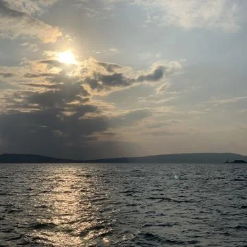 Sun in ocean Fotos de archivo