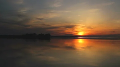 Sun over island on a lake Stock-Footage 54460294