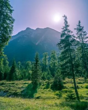 Sun over a mountain 写真素材