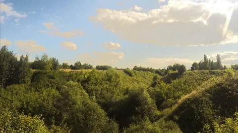 Sun over ravine in a summer park timelapse Stock Footage 87208686