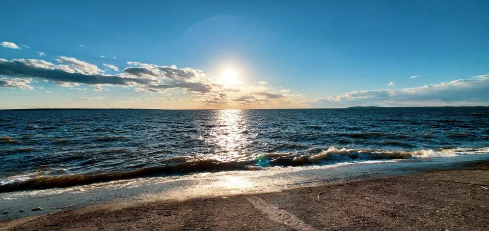 Sun over the river Stock Photos