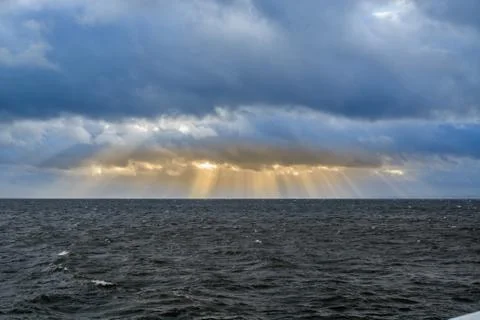 Sun over sea Stock Photos