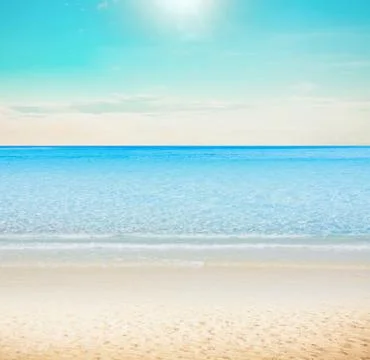 Sun over tropical beach Stock Photos