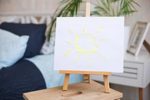 The sun painted on an easel Stock Photos
