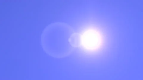 The sun passes across clear blue sky Stock Footage 159028143