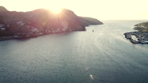 The sun passes behind the Citadel overlooking St. John's Harbour Video stock 214431172