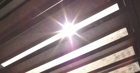 Sun passes through the window bars Video stock 301403933
