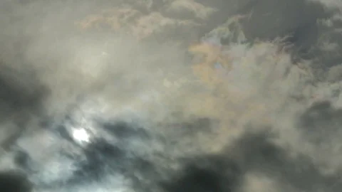 Sun Passing Behind Clouds 1 - Timelapse Stock Footage 80426161
