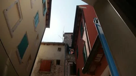 Sun passing over the roofs Timelapse 스톡 동영상 11322740