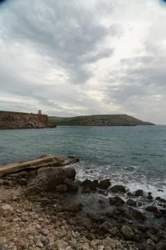Sun passing thru the clouds over ocean pier, Malta Stock Photos