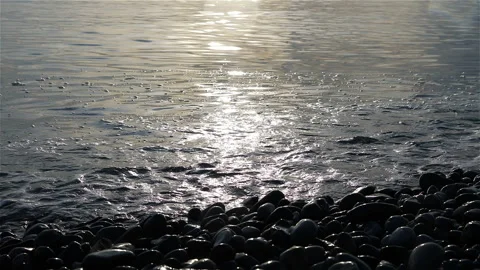 The sun path is reflected in the sea and goes out to the sea shore Stock Footage 132671595