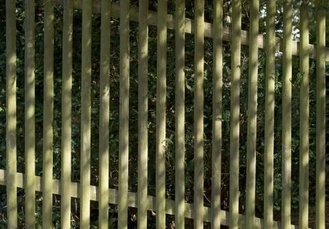 Sun pattern on a fence Stock Photos