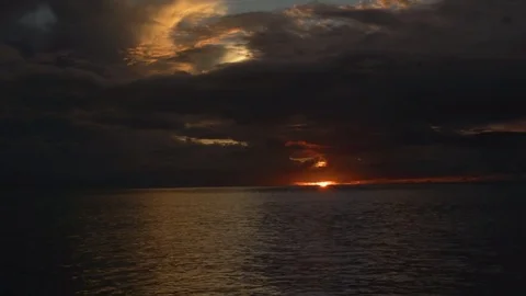 The sun peeking from the clouds Stock Footage 80242316