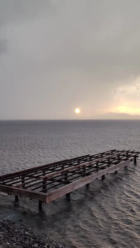 The sun peeking through the clouds after a rainy day, Stock Footage 325039809