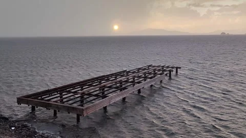 The sun peeking through the clouds after a rainy day, and the abandoned, Stock Footage 325040027