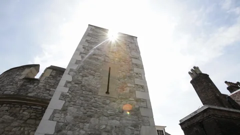 The sun peeks over the tower of London Stock Footage 89012724