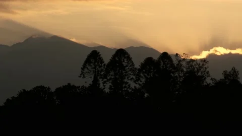 Sun peeps over mountains Nepal Stock Footage 144863993