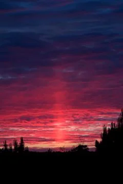 Sun pillar ar sunset Foto stock