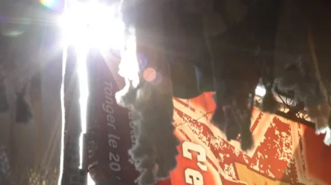 Sun playing off of fabrincs - Marrakech souk Video stock 40064387