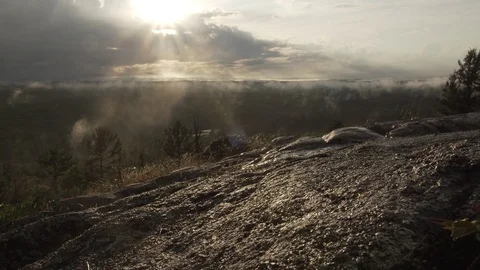 Sun poking through storm Stock Footage 100137993