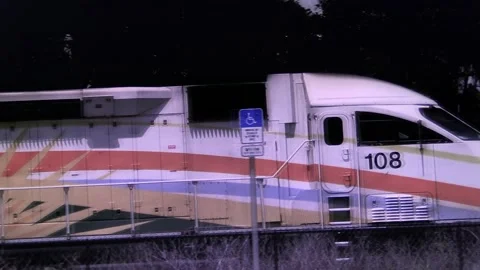 Sun rail train arriving from the right hand  side. Stock Footage 155080635