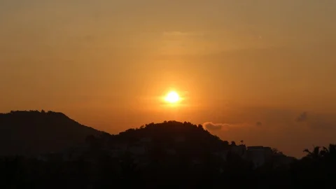 Sun raise back of mountains Stock Footage 97906814