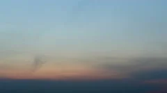 Sun raises on colourful sky at cloudy mo, Stock Video